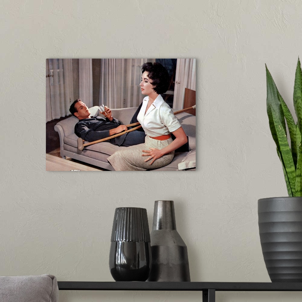 A modern room featuring Elizabeth Taylor and Paul Newman in Cat On A Hot Tin Roof - Movie Still