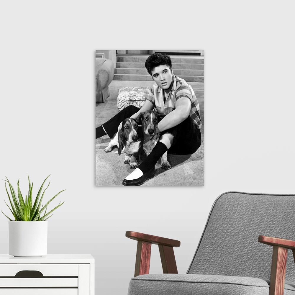 A modern room featuring Elvis Presley in Jailhouse Rock - Vintage Publicity Photo