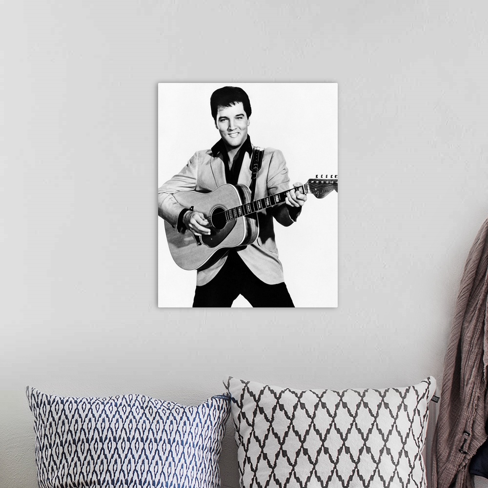 A bohemian room featuring Elvis Presley - Vintage Publicity Photo