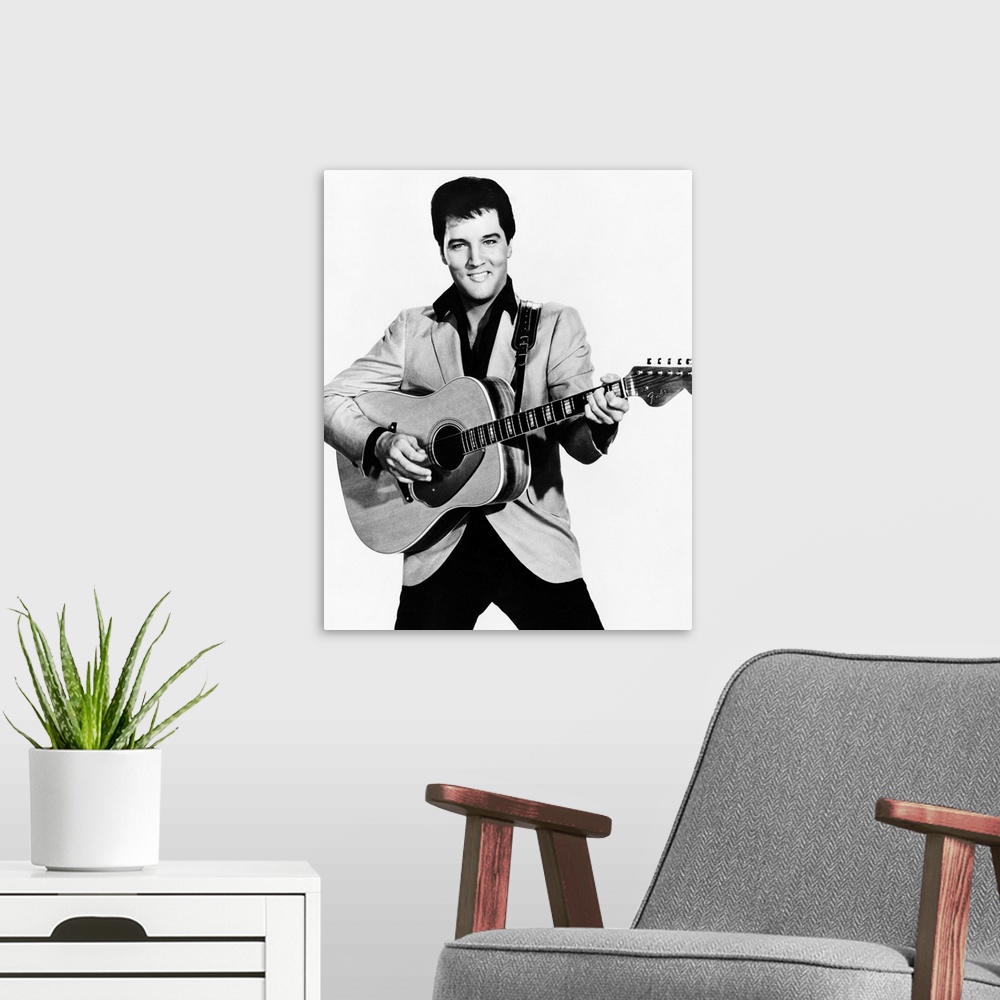 A modern room featuring Elvis Presley - Vintage Publicity Photo
