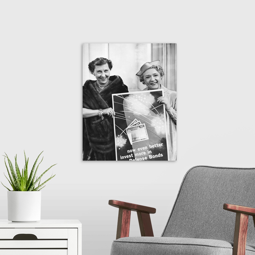 A modern room featuring First Lady Mamie Eisenhower and Actress Mary Pickford promote Defense Bonds. April 1, 1953. The i...