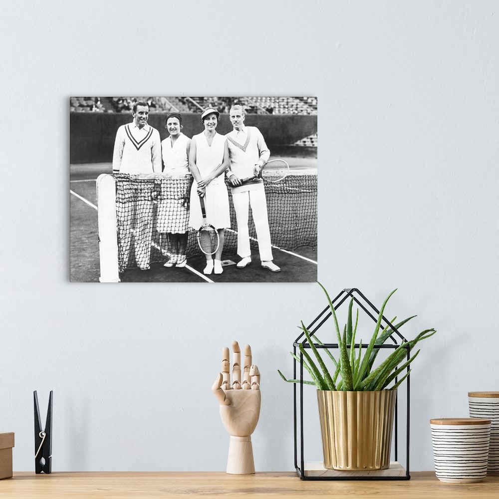 A bohemian room featuring Fred Perry and Betty Nuthall (left) of Britain won the French Mixed Doubles Championship. June 7,...