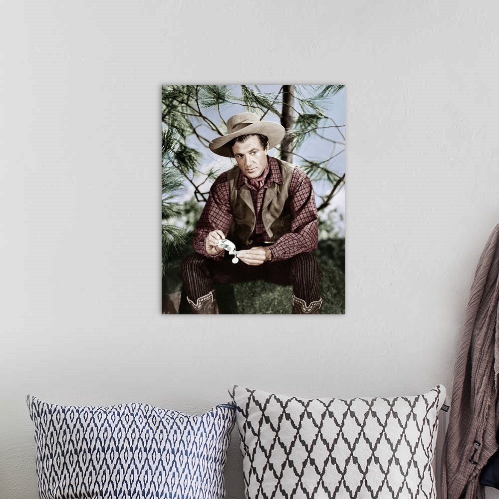 A bohemian room featuring Gary Cooper in North West Mounted Police - Vintage Publicity Photo