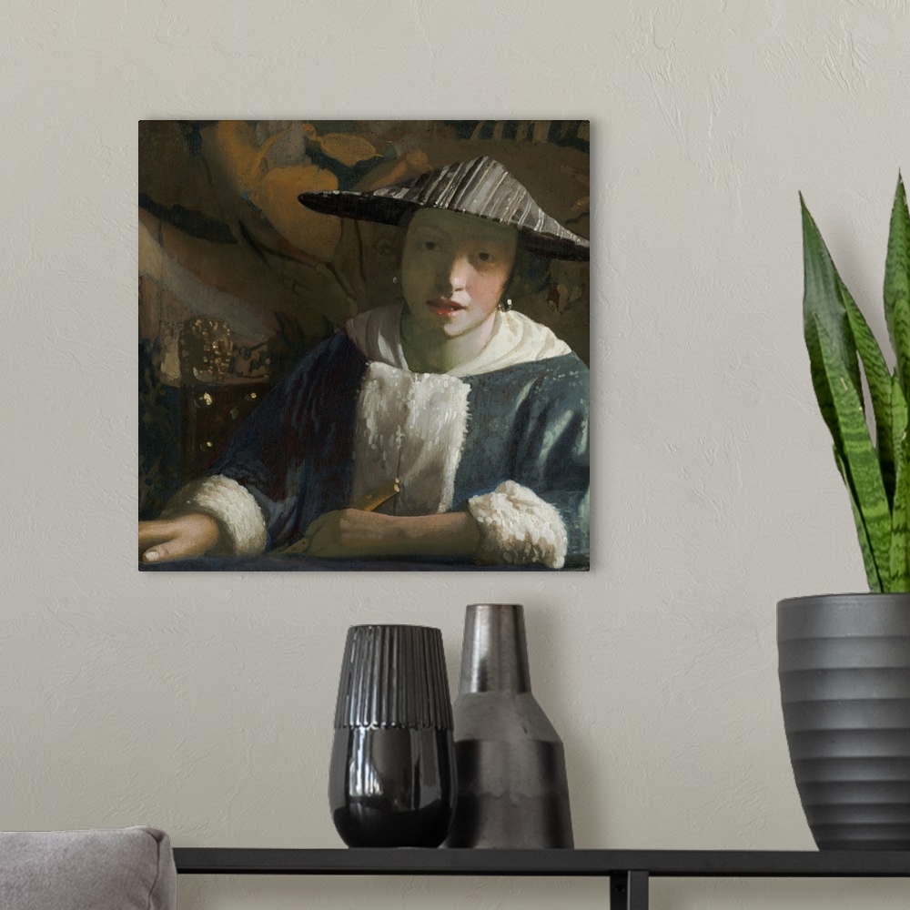 A modern room featuring Girl with a Flute, by Johannes Vermeer, c. 1665-70, Dutch painting, oil on canvas. She wears a ha...