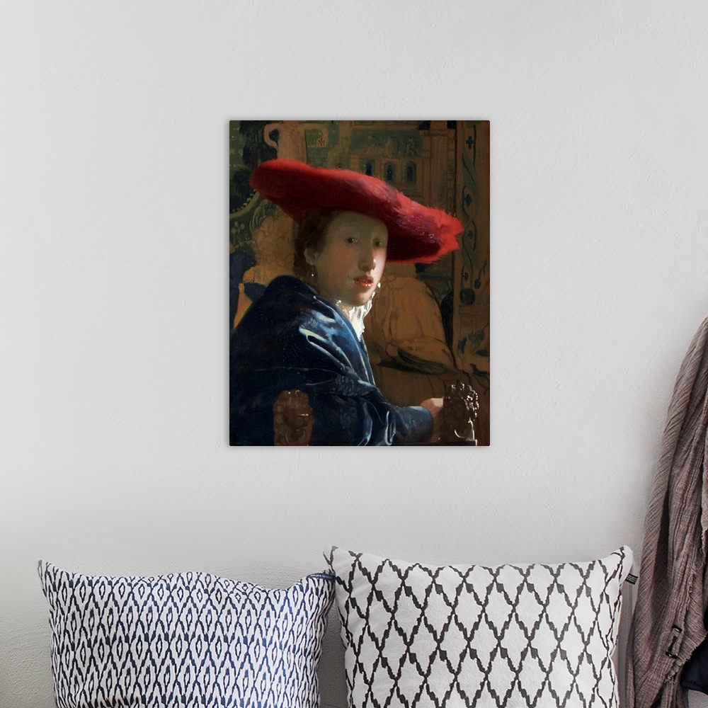 A bohemian room featuring Girl with the Red Hat, by Johannes Vermeer, c. 1665-66, Dutch painting, oil on canvas. Portrayed ...
