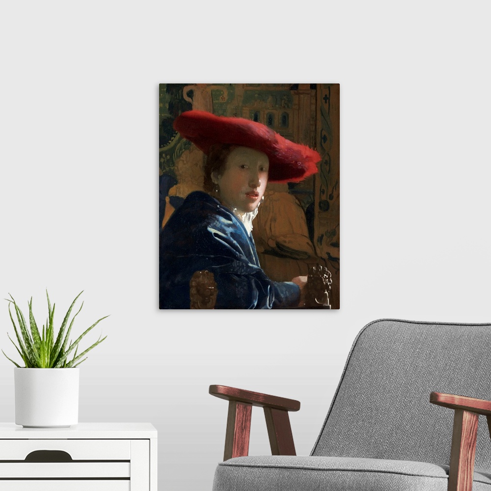 A modern room featuring Girl with the Red Hat, by Johannes Vermeer, c. 1665-66, Dutch painting, oil on canvas. Portrayed ...