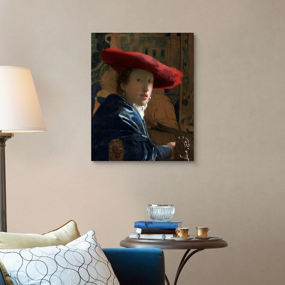 A traditional room featuring Girl with the Red Hat, by Johannes Vermeer, c. 1665-66, Dutch painting, oil on canvas. Portrayed ...