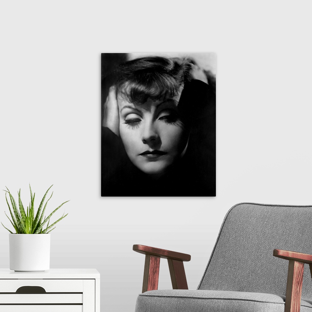 A modern room featuring Greta Garbo - Vintage Publicity Photo