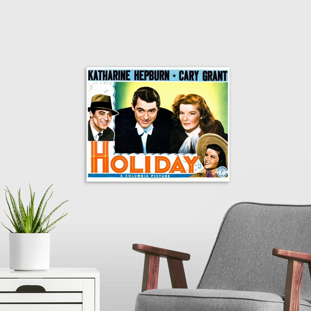 A modern room featuring Holiday - Vintage Movie Poster