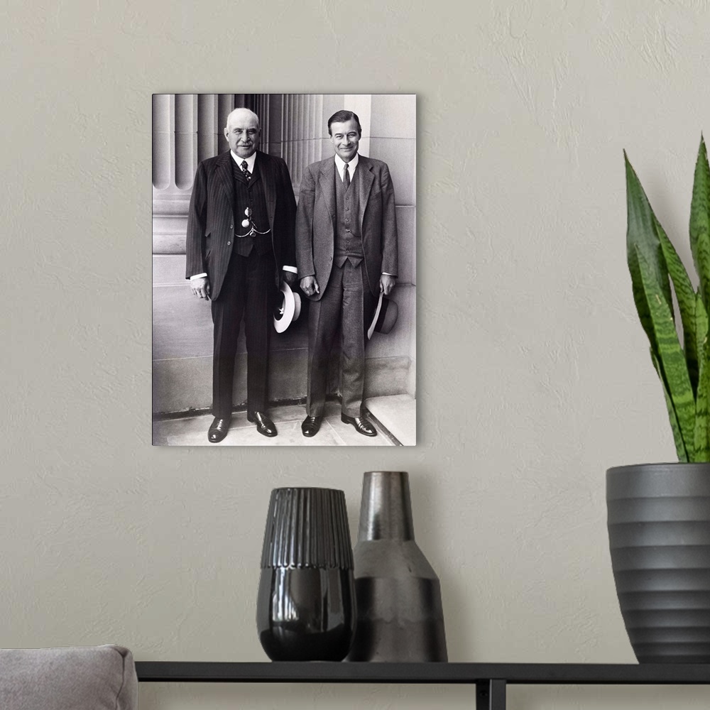 A modern room featuring J.P. Morgan Jr. (left) and son, Junius Morgan, at the Senate Banking and Currency Committee heari...