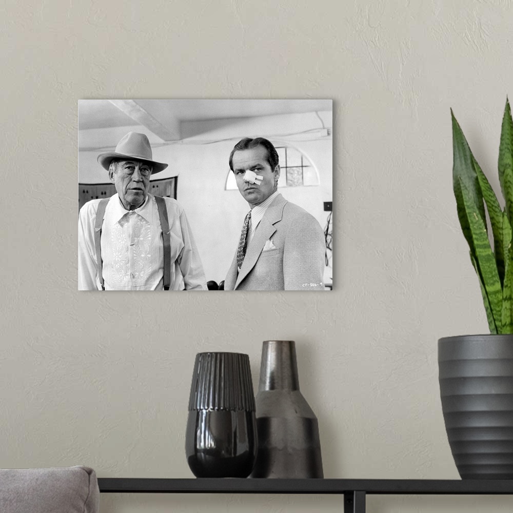 A modern room featuring Jack Nicholson and John Huston in Chinatown - Movie Still