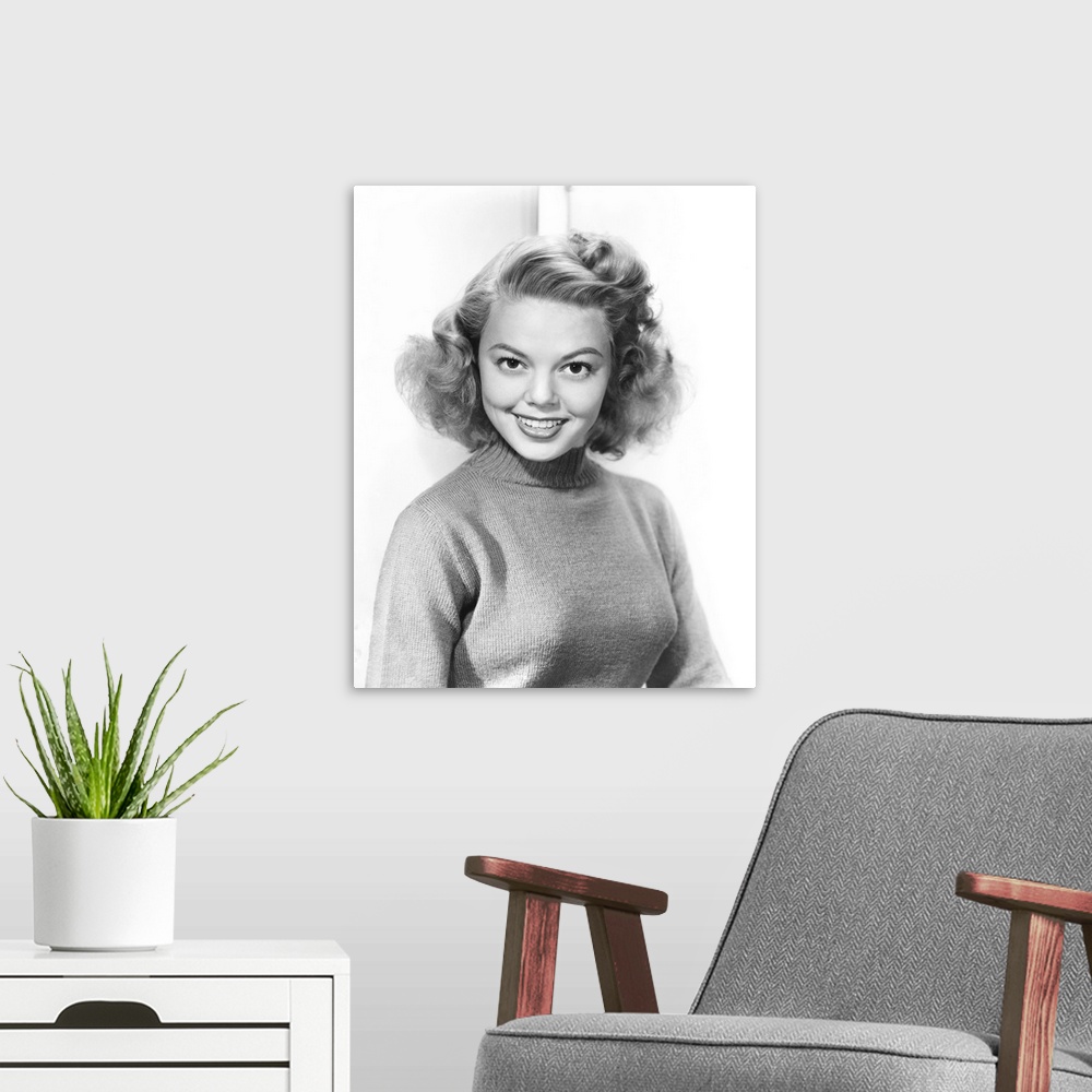 A modern room featuring Black and white photograph of Jean Porter.