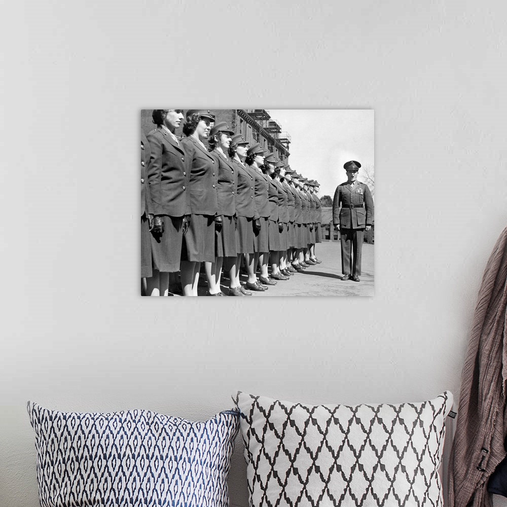 A bohemian room featuring Drill Instructor with uniformed recruits at Marine Corps Women's Reserve Officer's Candidate Scho...