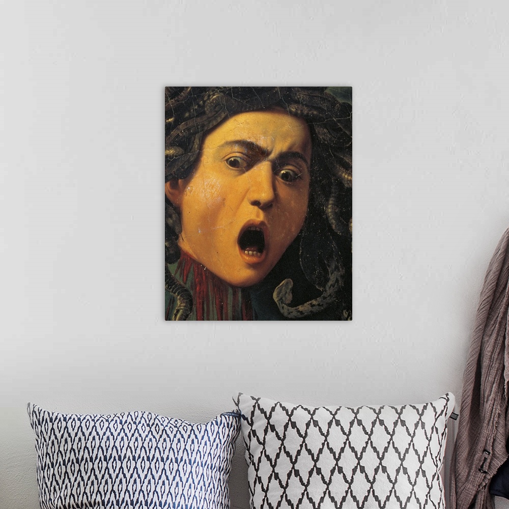 A bohemian room featuring Medusa, by Michelangelo Merisi known as Caravaggio, 1596 - 1598 about, 16th Century, oil on canva...