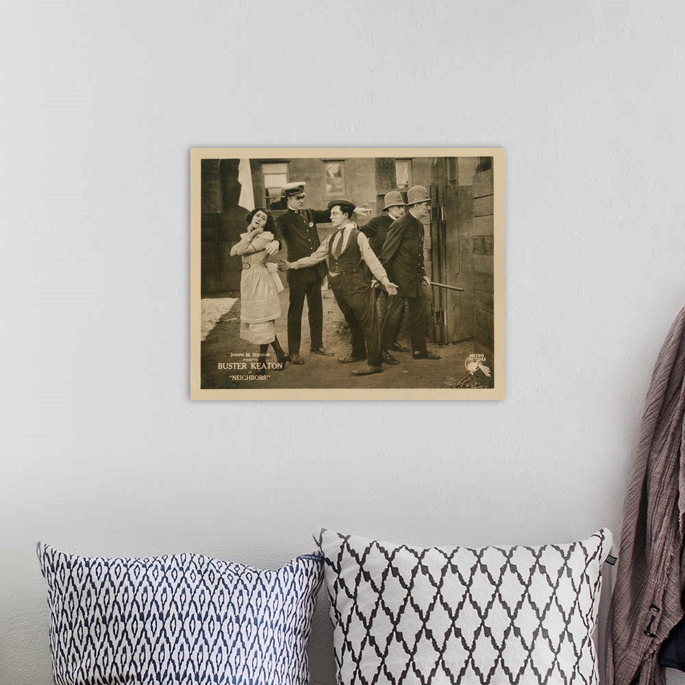 A bohemian room featuring Neighbors, Lobbycard, Front, From Left: Virginia Fox, Edward F. Cline, Buster Keaton, 1920.