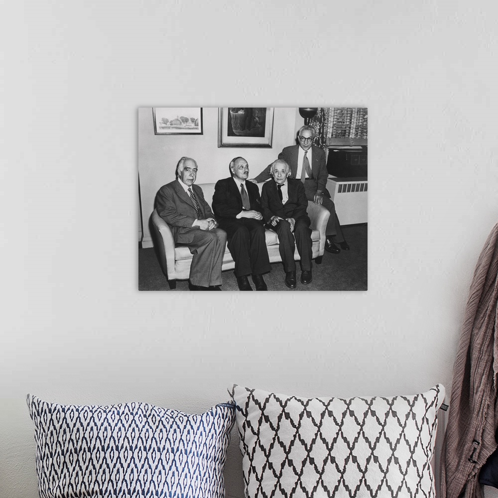A bohemian room featuring Portrait of four famous nuclear physicists. L-R: Niels Bohr; James Franck; Albert Einstein; and I...