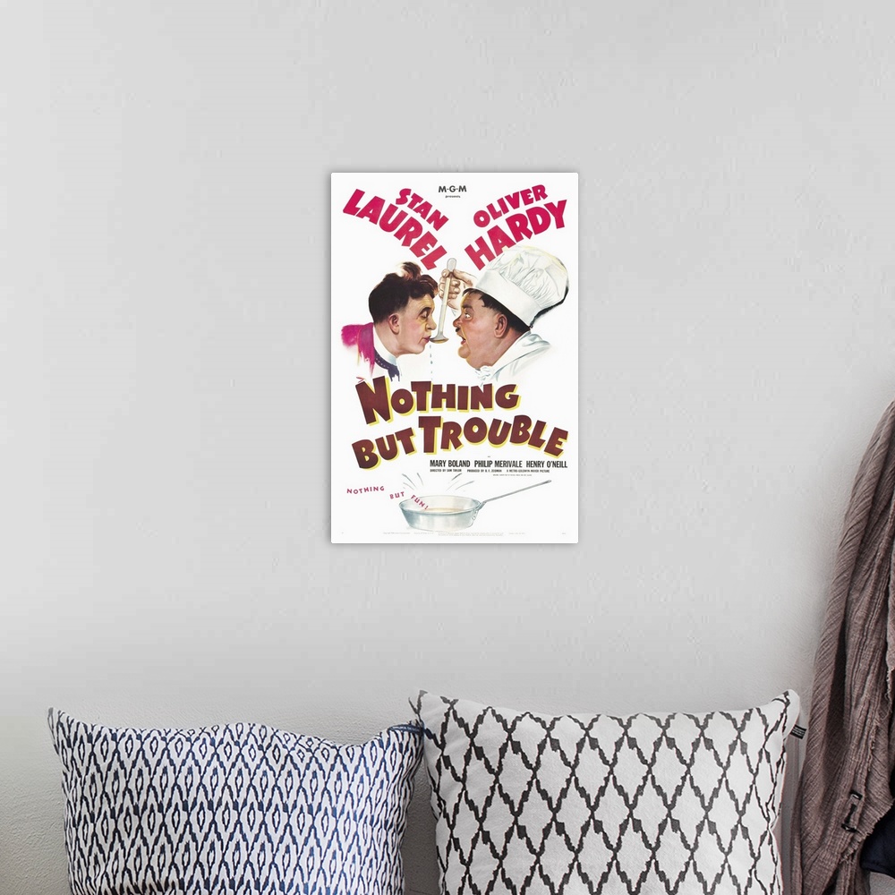 A bohemian room featuring Nothing but Trouble - Vintage Movie Poster