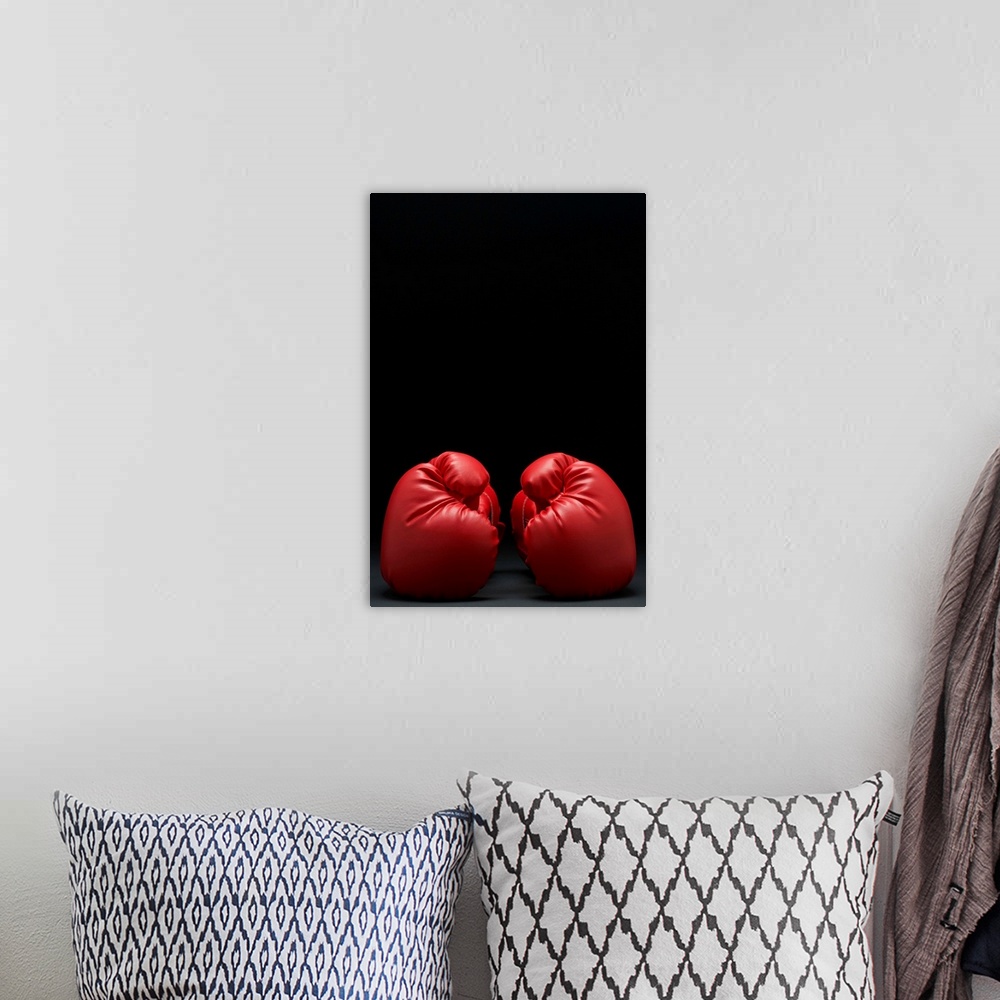 A bohemian room featuring Pair Of Red Boxing Gloves