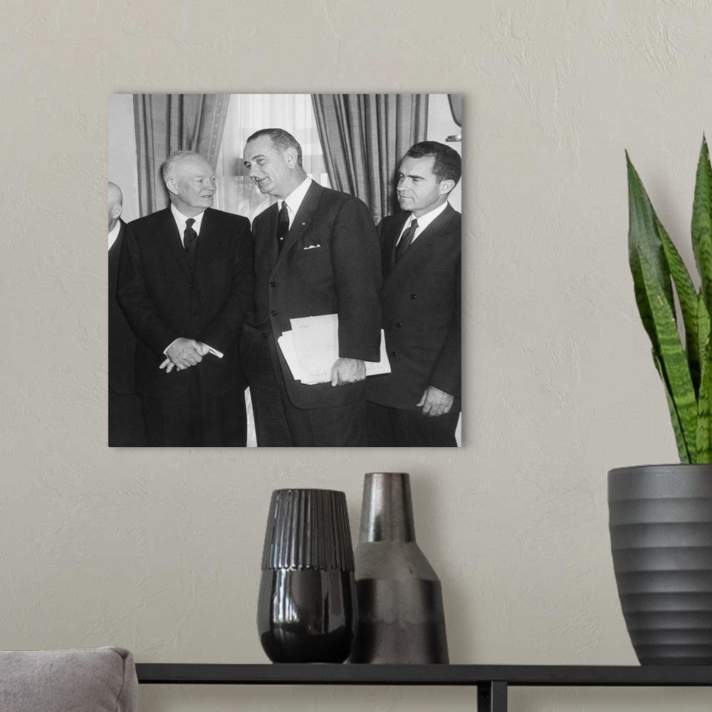 A modern room featuring President Eisenhower and future Presidents Lyndon Johnson and Richard Nixon. White House Oval Off...