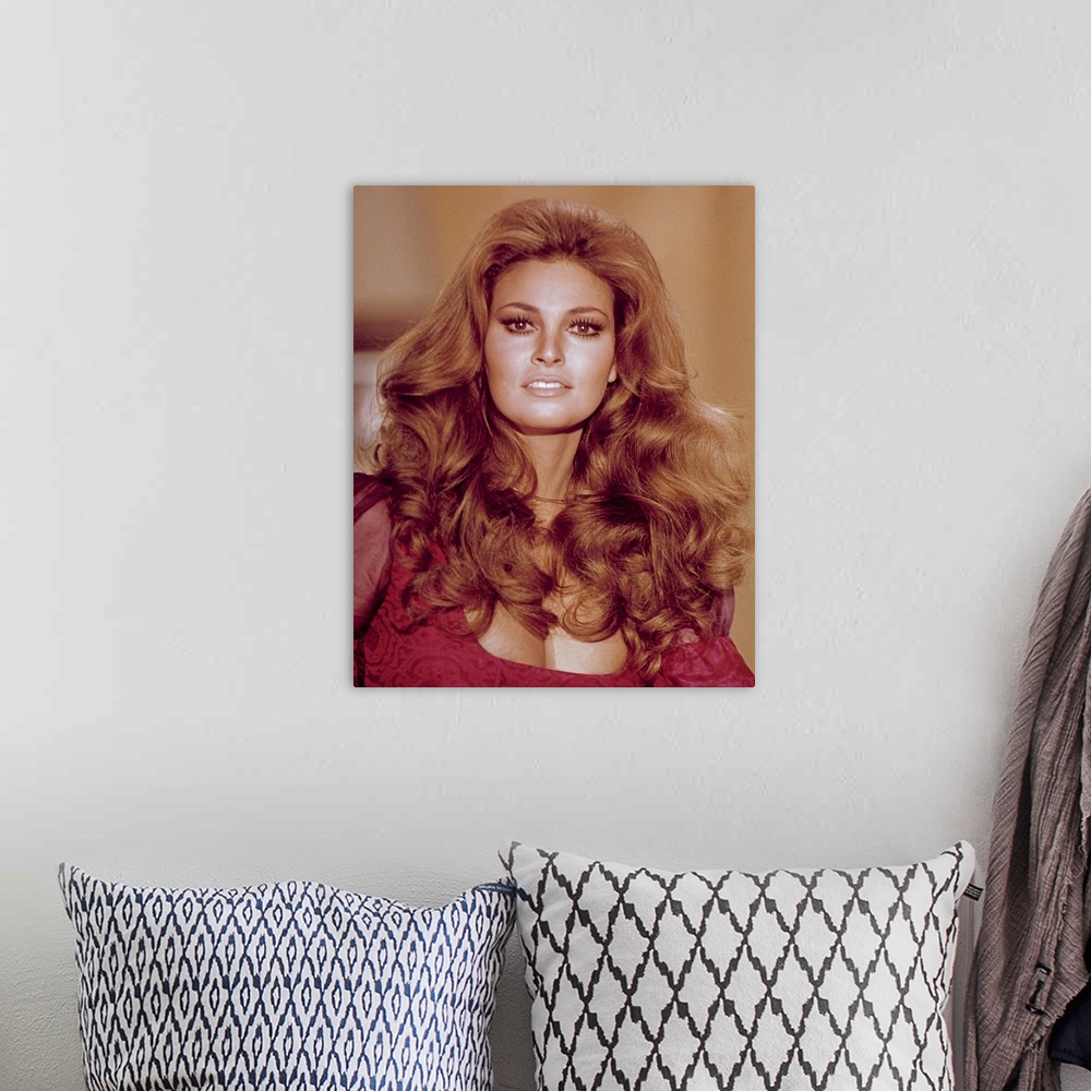 A bohemian room featuring Raquel Welch - Vintage Publicity Photo