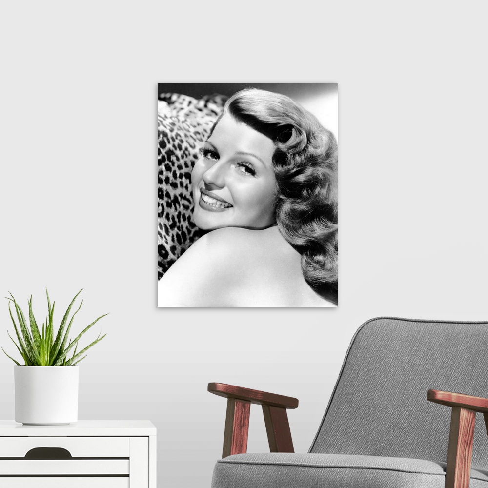 A modern room featuring Rita Hayworth in Cover Girl - Vintage Publicity Photo