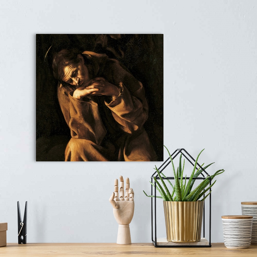 A bohemian room featuring Saint Francis in Prayer, by Merisi Michelangelo known as Caravaggio, 17th Century, 1606 -1607 abo...