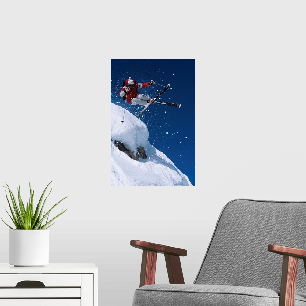 A modern room featuring Skier In Mid-Air Above Snow On Ski Slopes