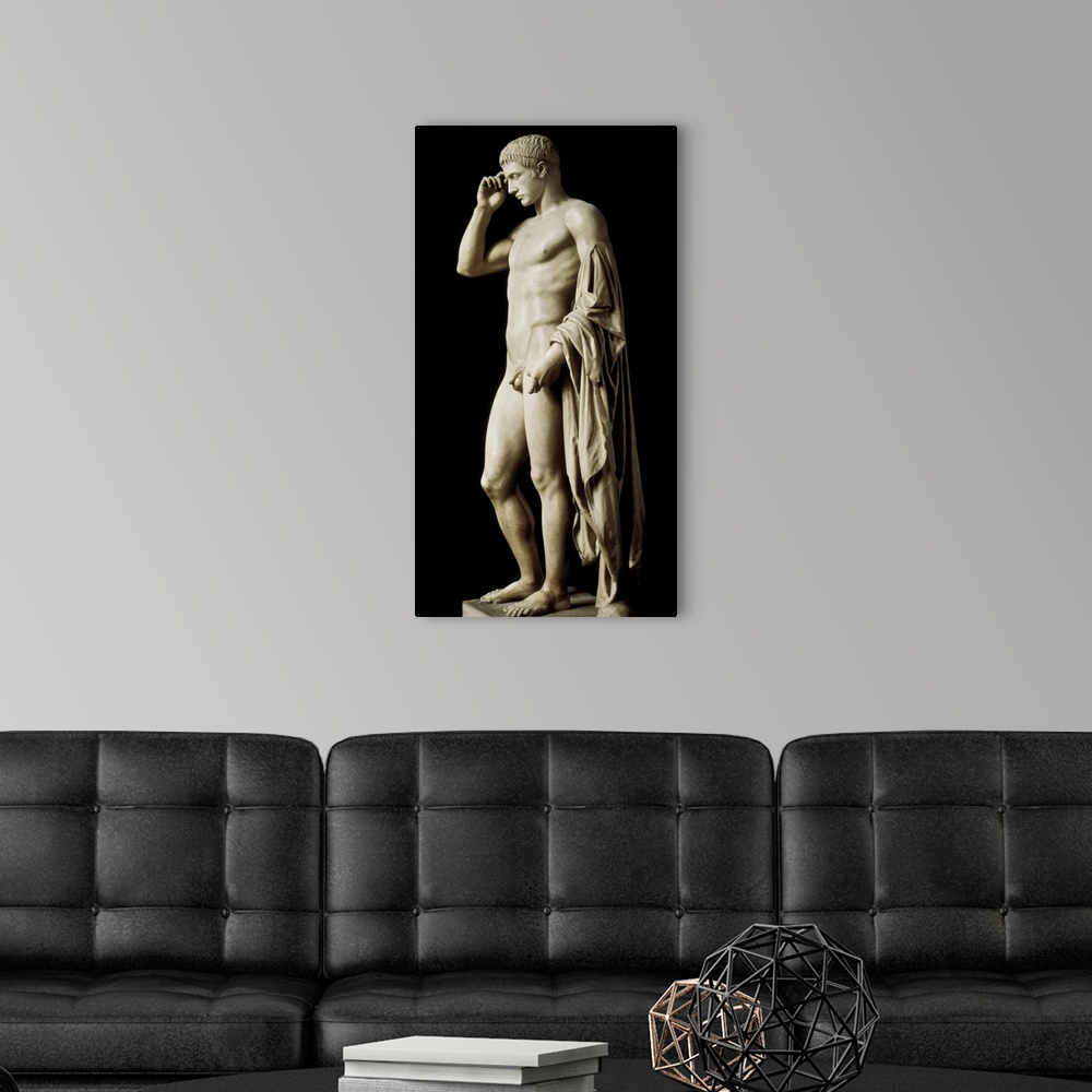 A modern room featuring Statue of Marcellus (Statue de Marcellus). 34 BC. Caesar's nephew. He expanded the Empire territo...