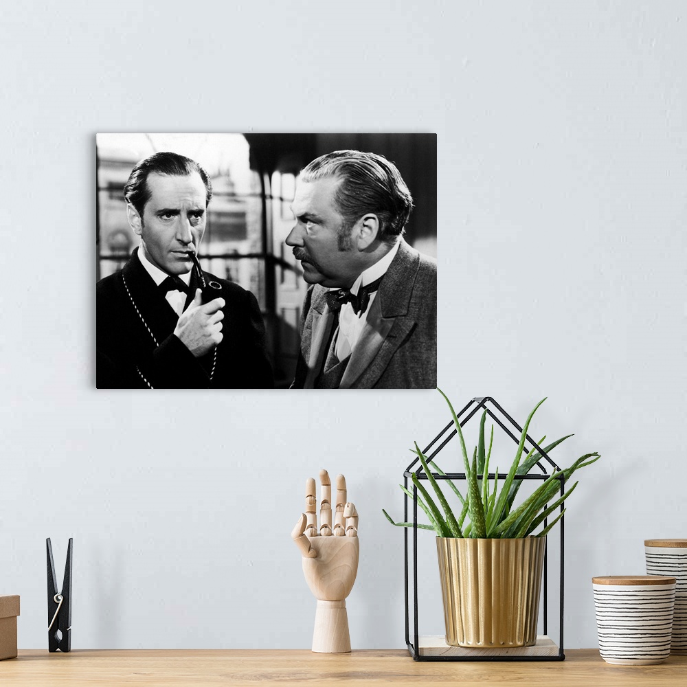 A bohemian room featuring The Adventures Of Sherlock Holmes, From Left: Basil Rathbone As Sherlock Holmes, Nigel Bruce As W...