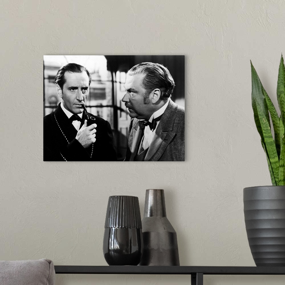 A modern room featuring The Adventures Of Sherlock Holmes, From Left: Basil Rathbone As Sherlock Holmes, Nigel Bruce As W...