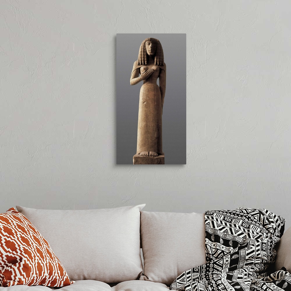 A bohemian room featuring The Auxerre Goddess, Archaic Greek art