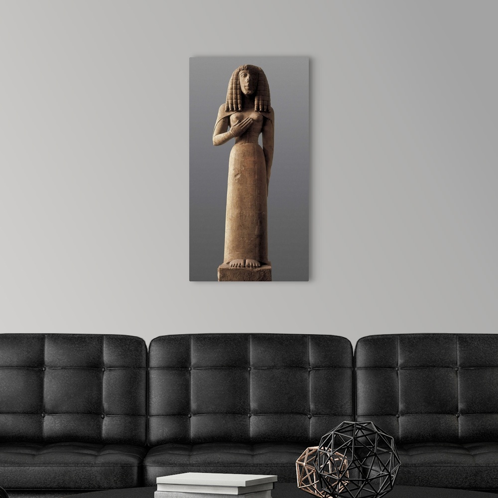 A modern room featuring The Auxerre Goddess, Archaic Greek art