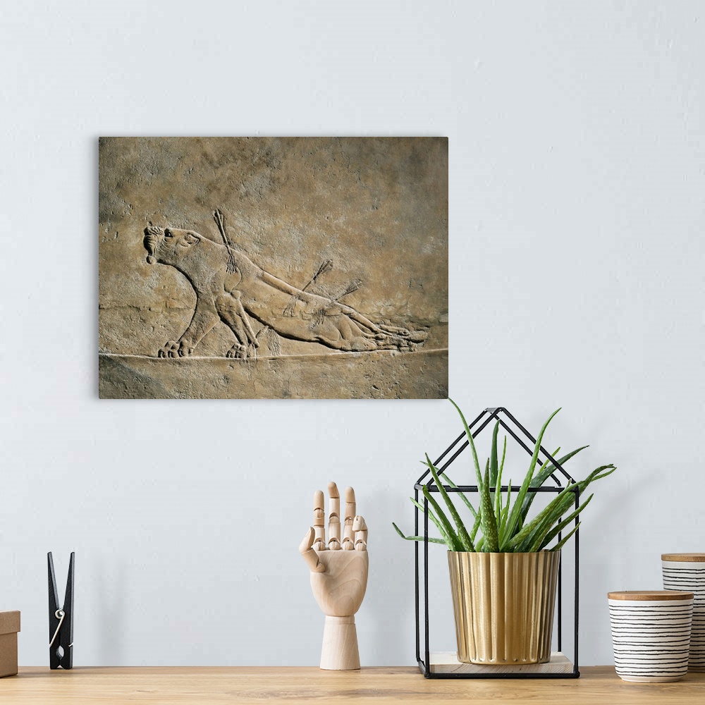 A bohemian room featuring The Dying Lion, Assyrian art