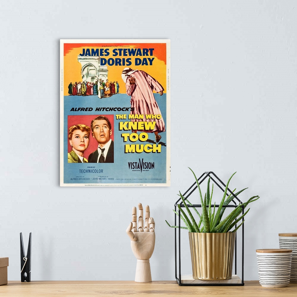A bohemian room featuring The Man Who Knew Too Much - Vintage Movie Poster