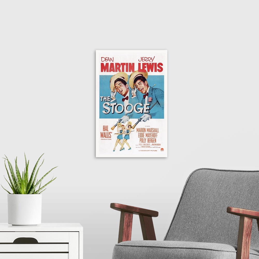 A modern room featuring Retro poster artwork for the film The Stooge.