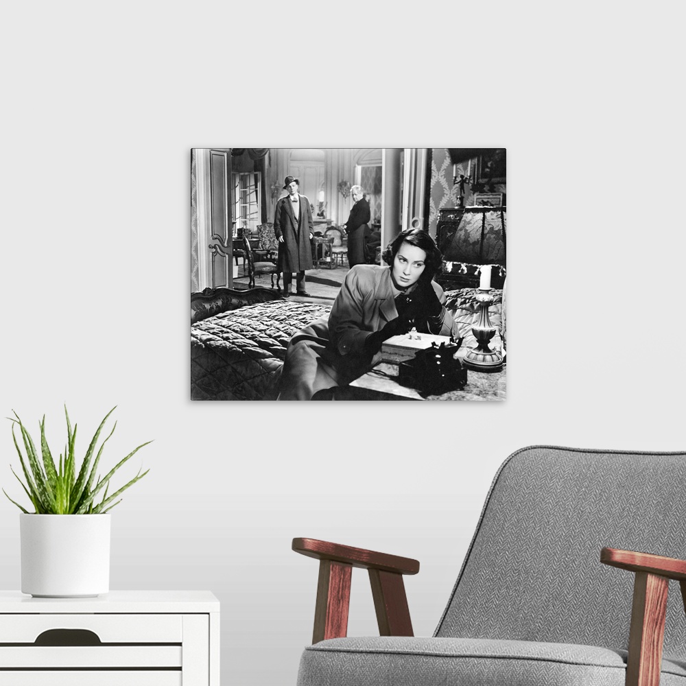 A modern room featuring THE THIRD MAN, Alida Valli (front), Joseph Cotten (center), Paul Horbiger (right), 1949