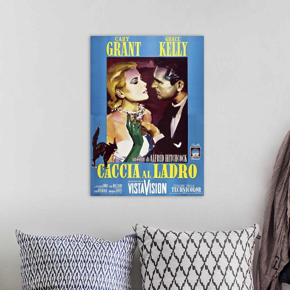 A bohemian room featuring TO CATCH A THIEF (aka CACCIA AL LADRO), from left: Grace Kelly, Cary Grant on Italian poster art,...