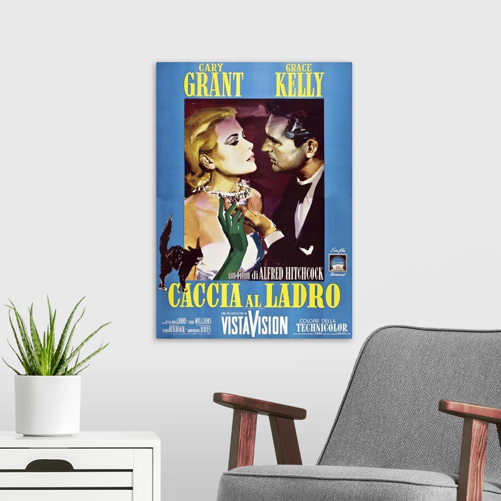 A modern room featuring TO CATCH A THIEF (aka CACCIA AL LADRO), from left: Grace Kelly, Cary Grant on Italian poster art,...