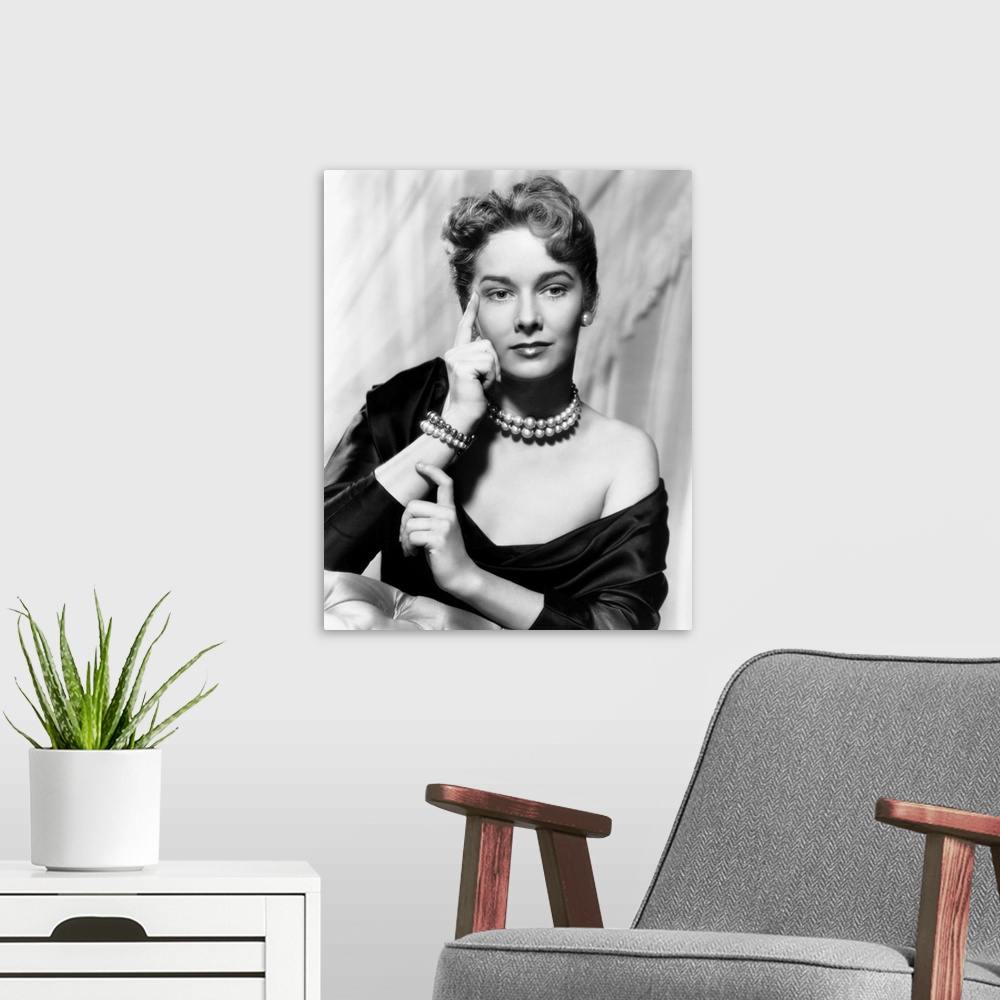 A modern room featuring Black and white photograph of Vera Miles.