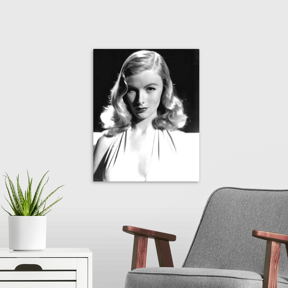 A modern room featuring Vintage black and white photograph of actress Veronica Lake.