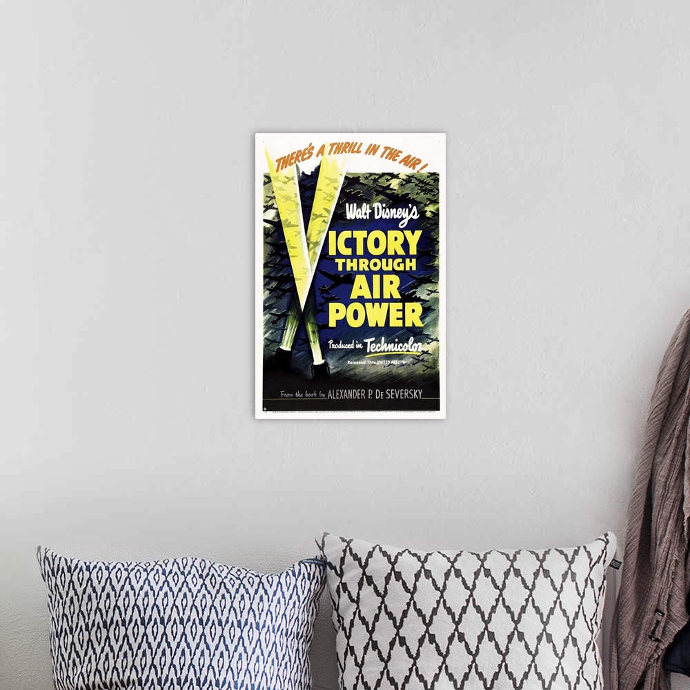 A bohemian room featuring Victory Through Air Power - Vintage Movie Poster