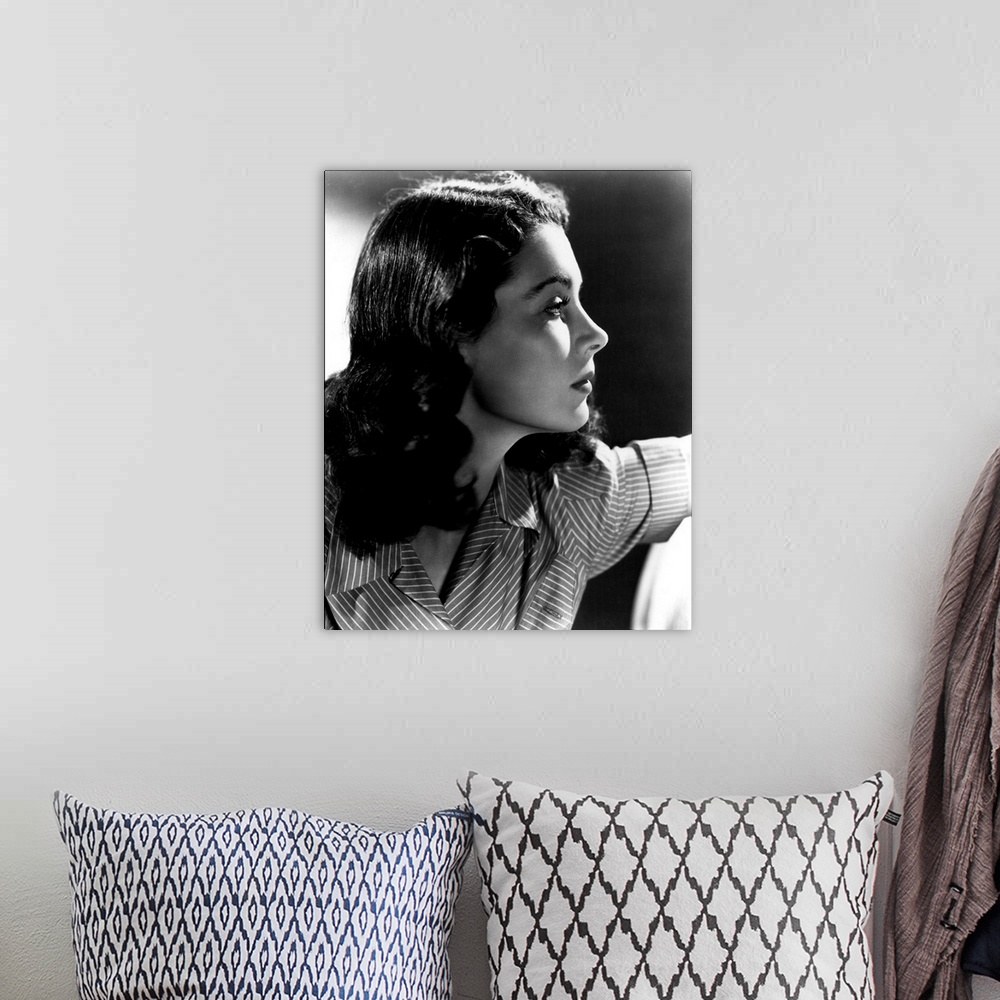 A bohemian room featuring Vintage black and white publicity photograph of actress Vivien Leigh.