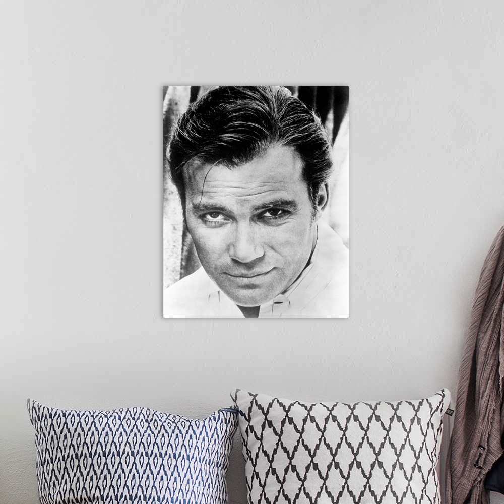 A bohemian room featuring Black and white photograph of William Shatner.