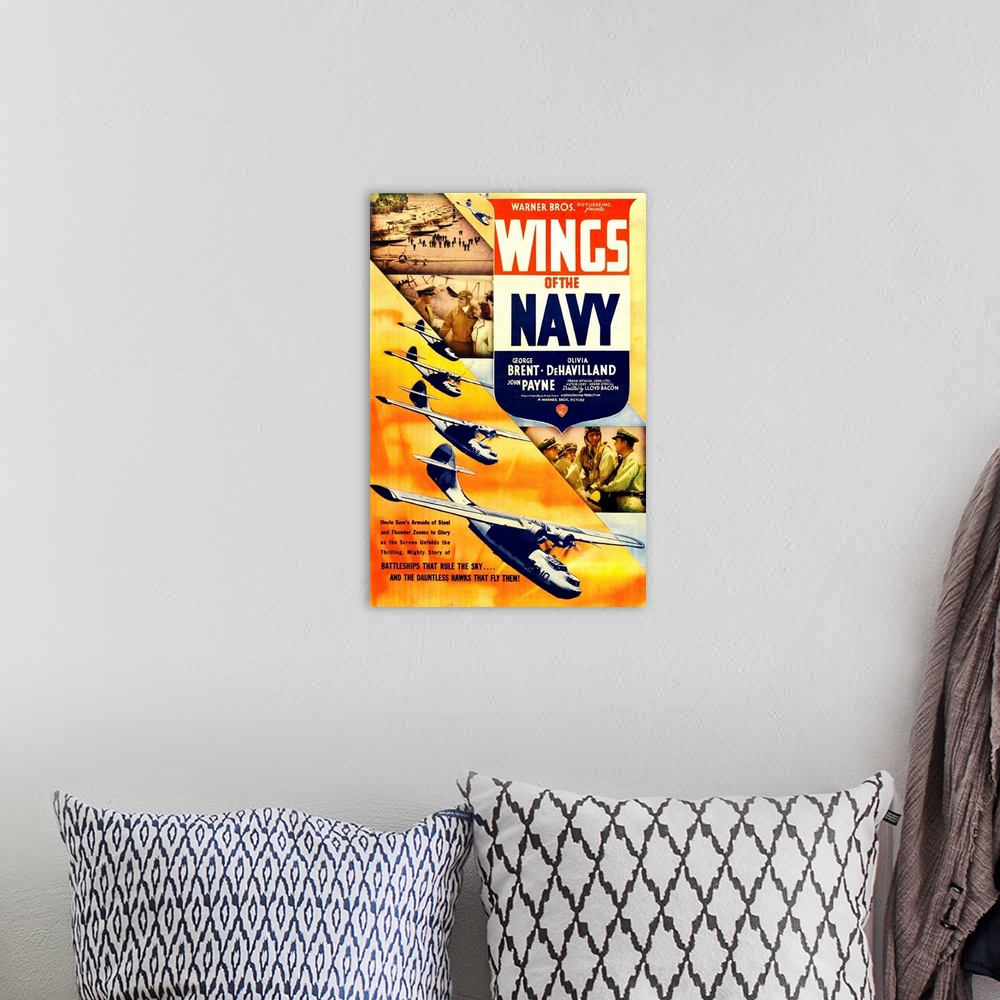 A bohemian room featuring WINGS OF THE NAVY, US poster, top from left: John Payne, George Brent, Olivia DeHavilland, 1939