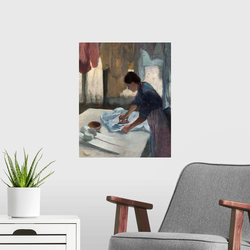 A modern room featuring Woman Ironing, by Edgar Degas, 1878-87, French impressionist painting, oil on canvas. Degas was i...