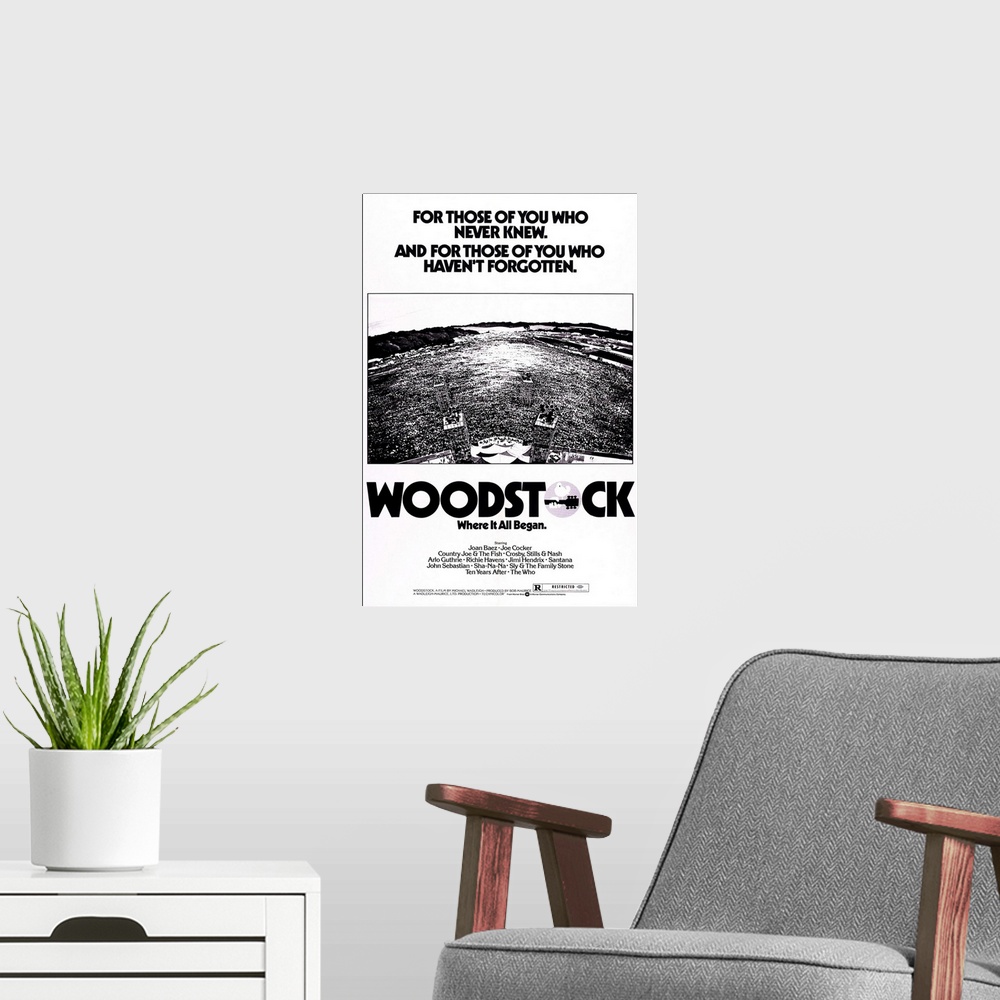 A modern room featuring WOODSTOCK, 1976 re-release poster art, 1970.