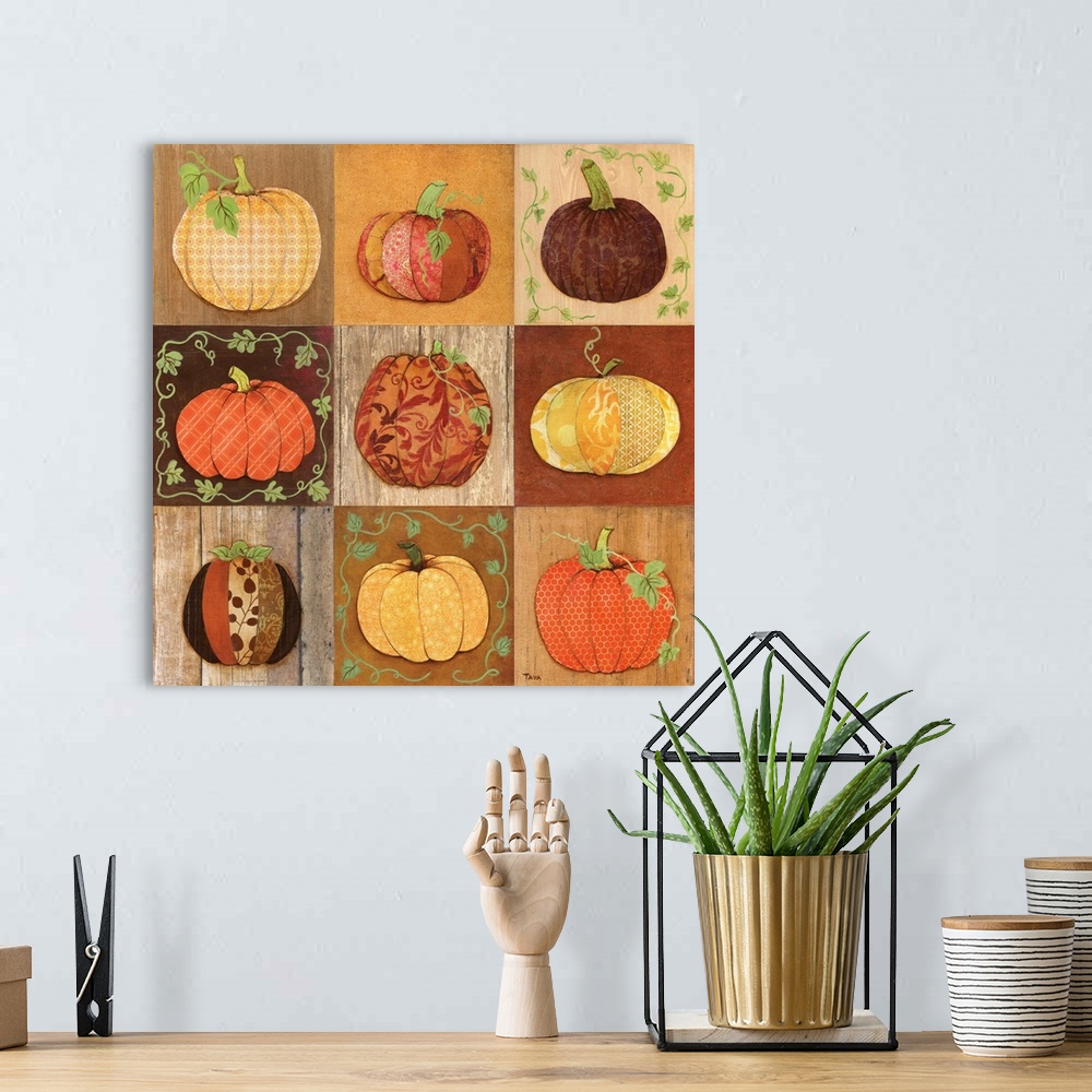 A bohemian room featuring A decorative Fall painting of 9 beautifully designed pumpkins on a wooden background.