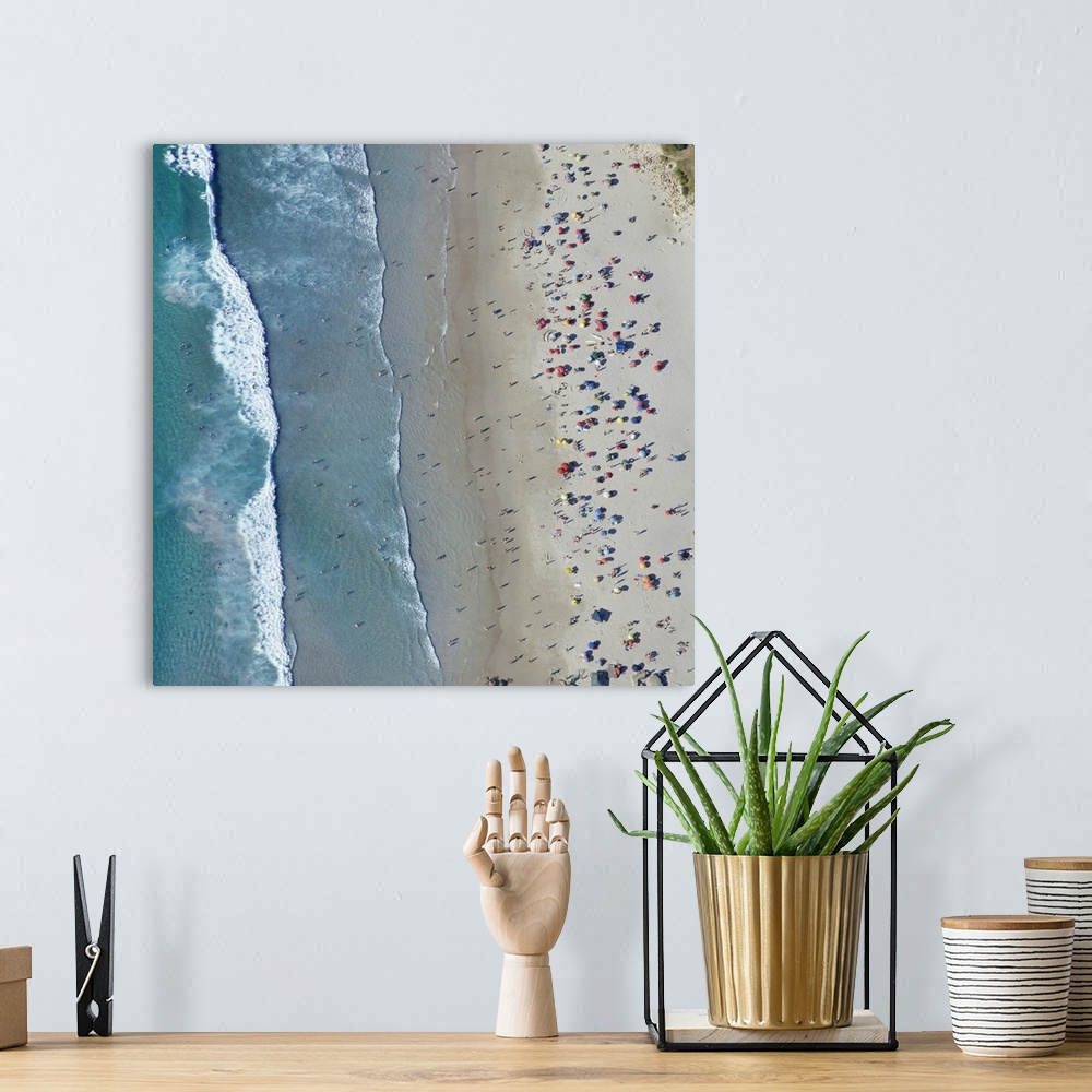 A bohemian room featuring Aerial view of People at Llandudno Beach, Cape Town, South Africa.