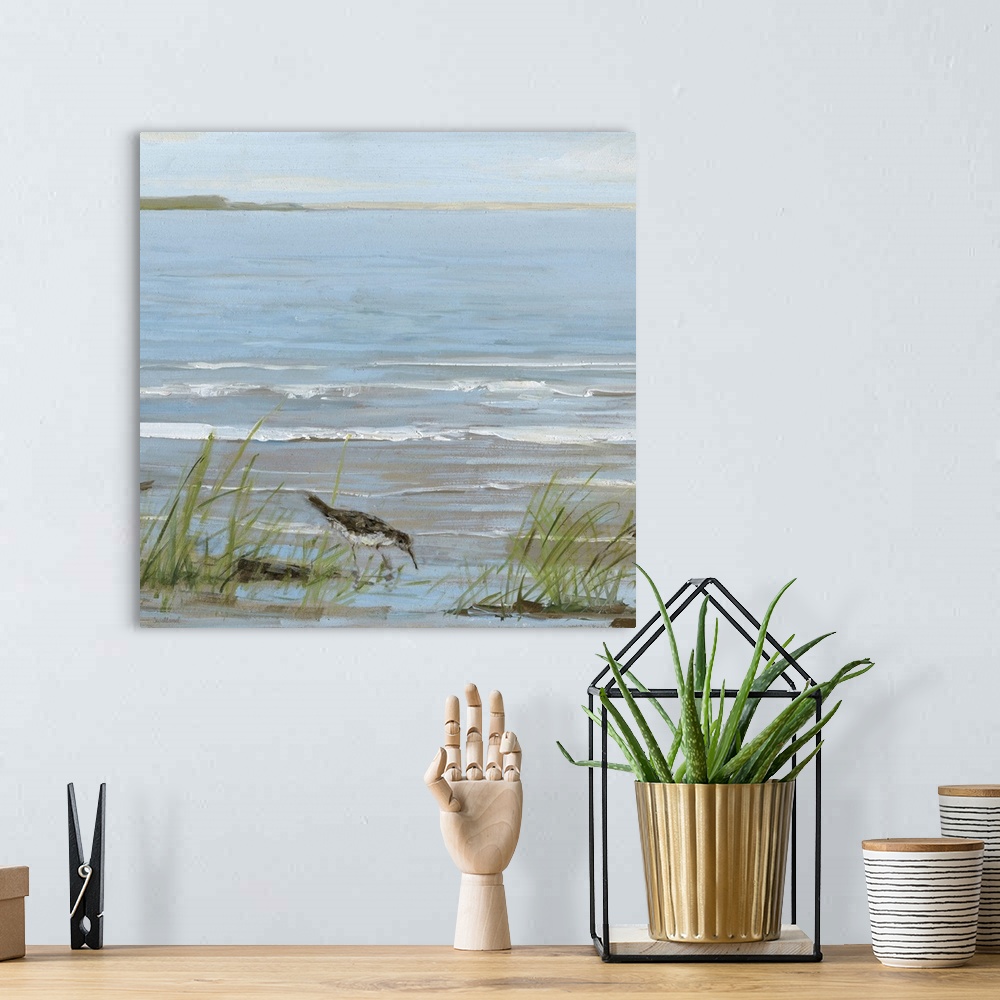 A bohemian room featuring Contemporary square painting of a seabird grazing a shallow shore with small waves in the backgro...