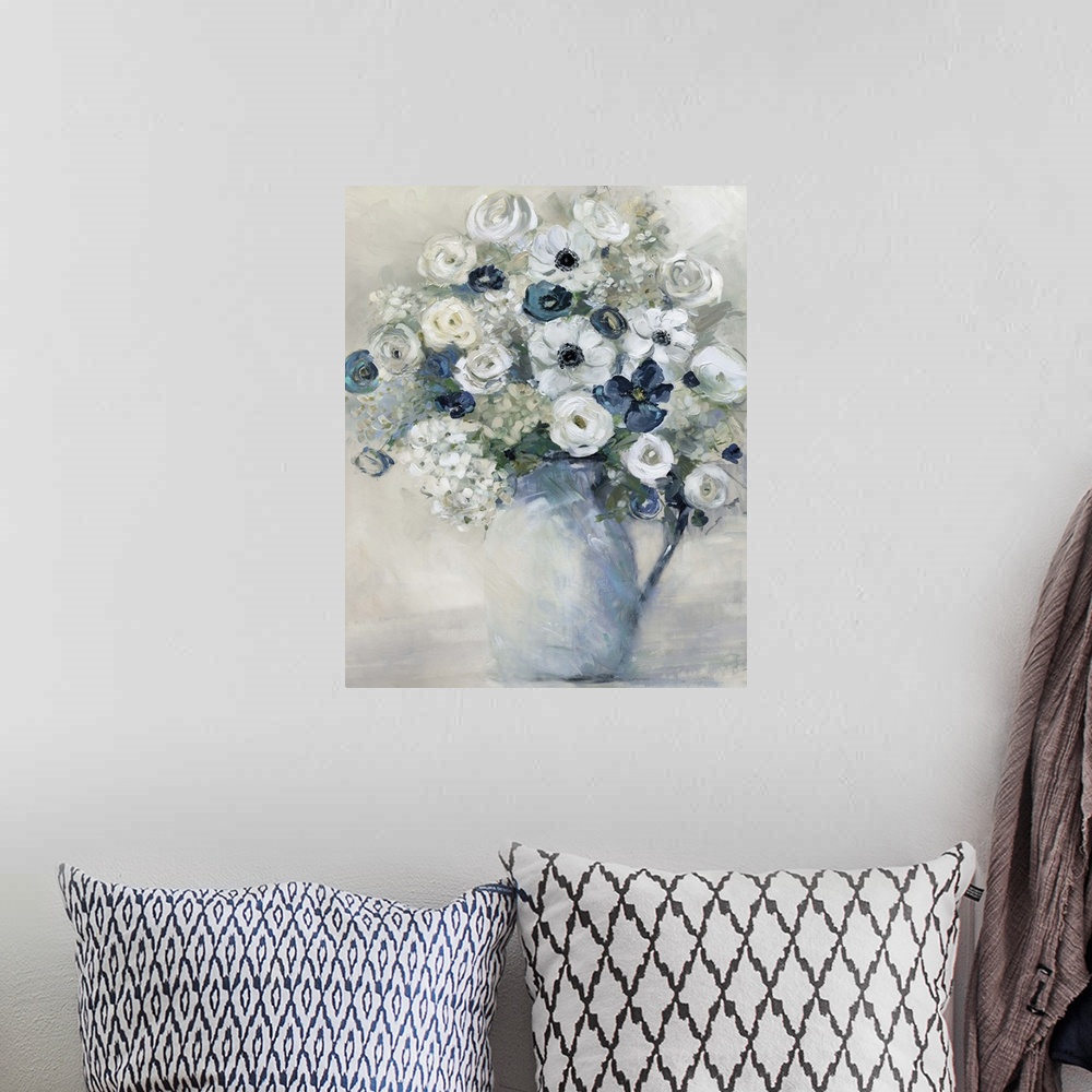 A bohemian room featuring Vertical artwork of a vase full of flowers in tones of blue, grey and white.